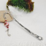 bookmark with silver music note theme and beautiful handmade peel with poppy design